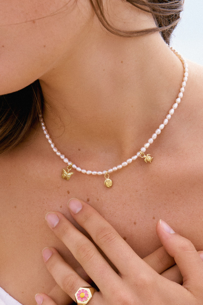 Three Charm Pearl Necklace